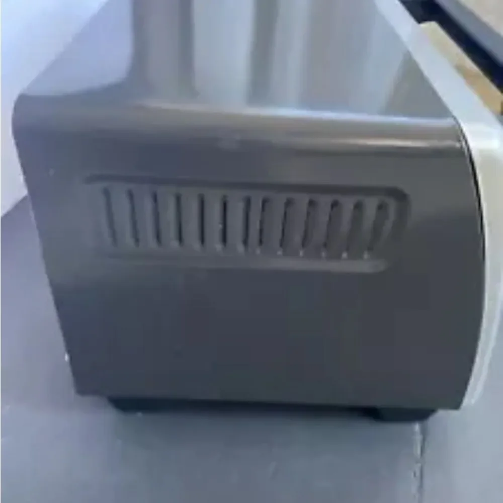 Black & Decker 4-Slice Toast-R-Oven Even Toast Technology TO1322SBD Timer